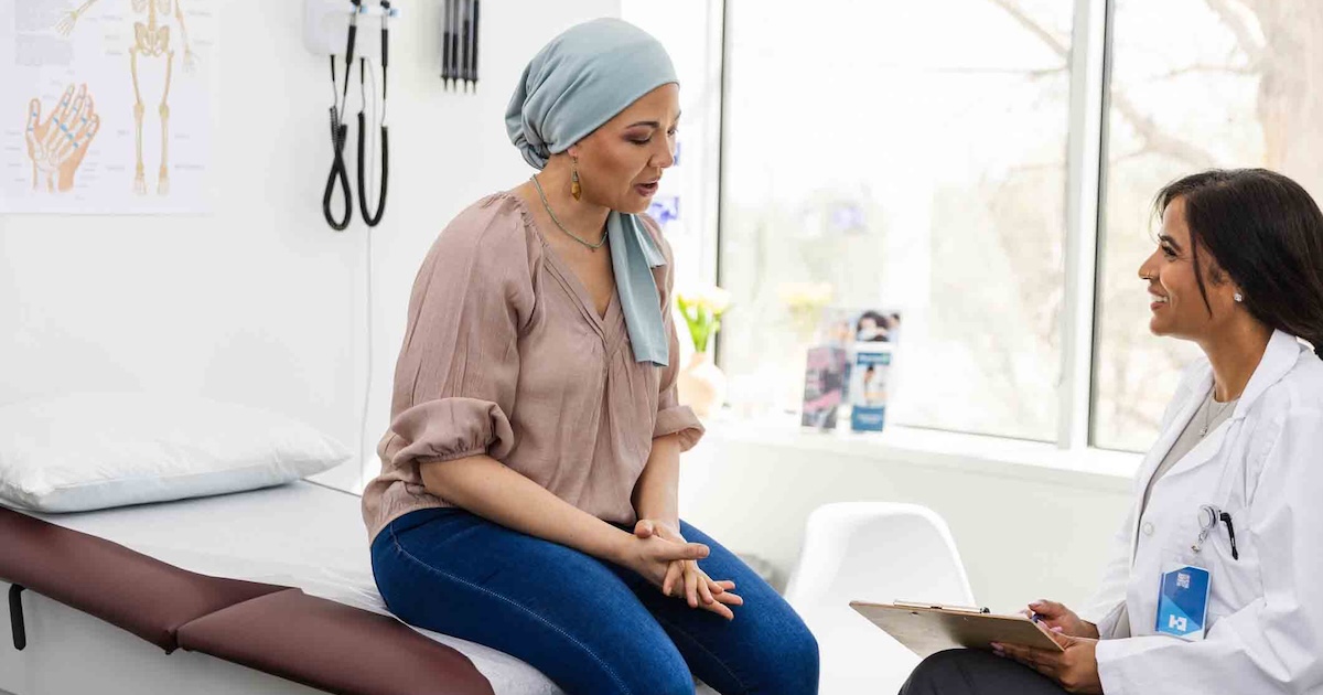 Cancer patient with a doctor Cancer patient with a doctor