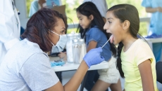 Healthcare provider examining a patient