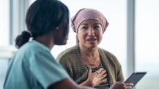 Healthcare professional talking to a patient