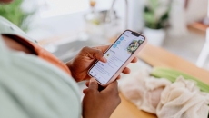 Person looking at a health app on their phone