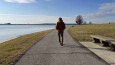Person walking near an ocean