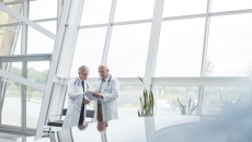 Healthcare professionals conferring 