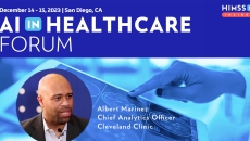 Albert Marinez at Cleveland Clinic_ Doctor looking at brain scan on tablet photo by katleho Seisa/Getty Images