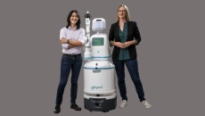 Diligent Robotics cofounders Andrea Thomaz and Vivian Chu with the Moxi robot