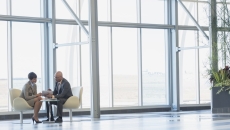 Executives conferring