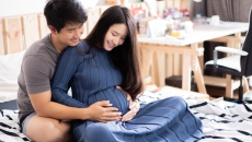 Two people sitting on the floor