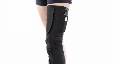 A close up of a person wearing the Cionic Neural Sleeve