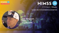 Joe Gagnon at 1upHealth_Palm trees and skyscrapers in Orlando Photo by Gabriele Maltinti/iStock/Getty Images Plus