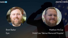 Matthew McCay and Brett Barker_Silhoutte of solider with US flag Photo by e-crow/iStock/Getty Images Plus