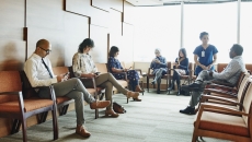 Patients sitting in a physician waiting room