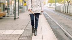 Person walking with a cane