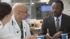 Clinicians, administrator in conference