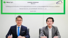 Heuron and Medhealth Informatics representatives during a distribution deal signing