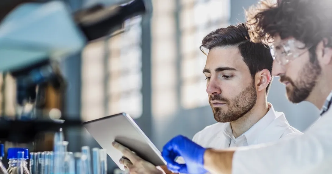 Healthcare professionals looking at tablet computer