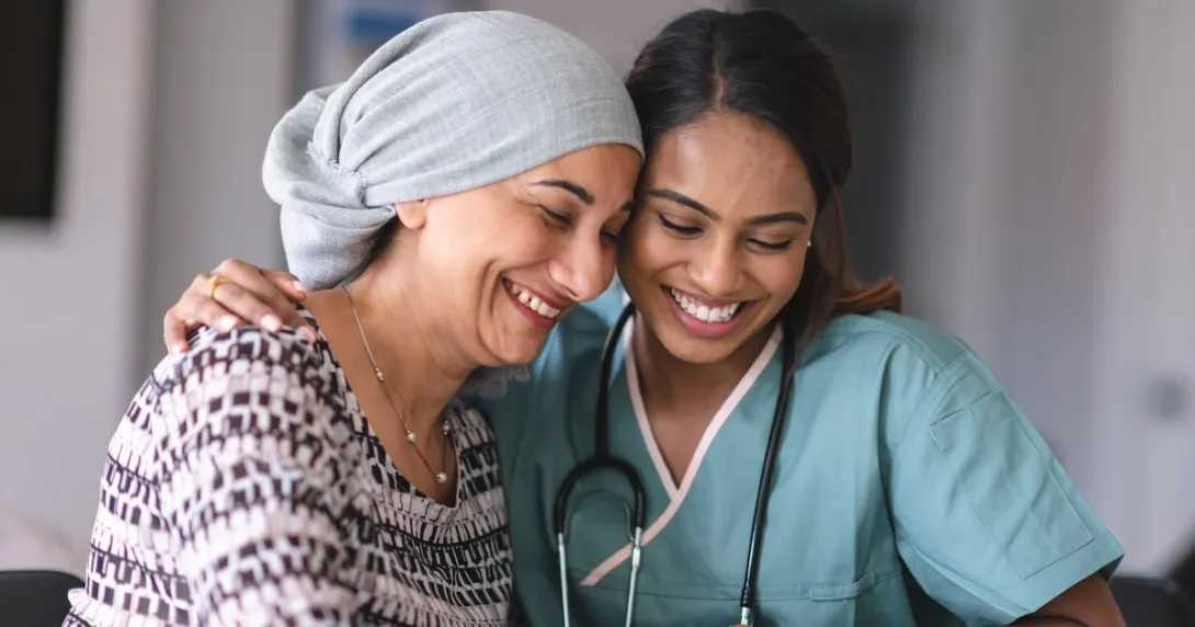A cancer patient with their doctor