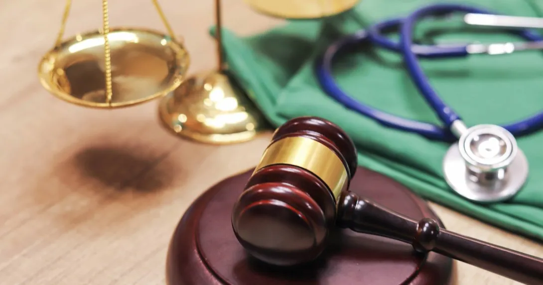 A gavel next to a stethoscope