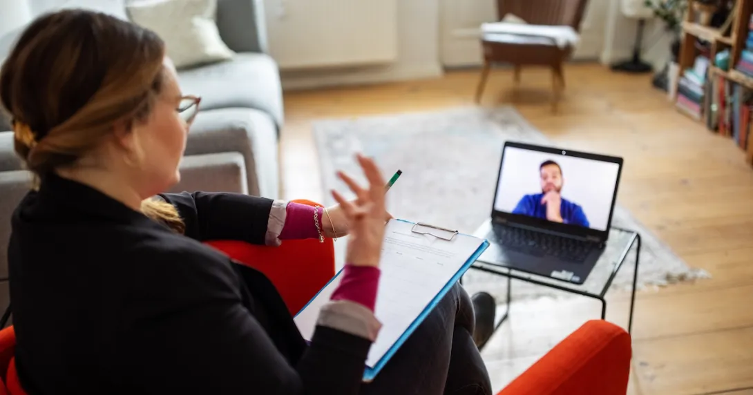 Person talking to someone over computer