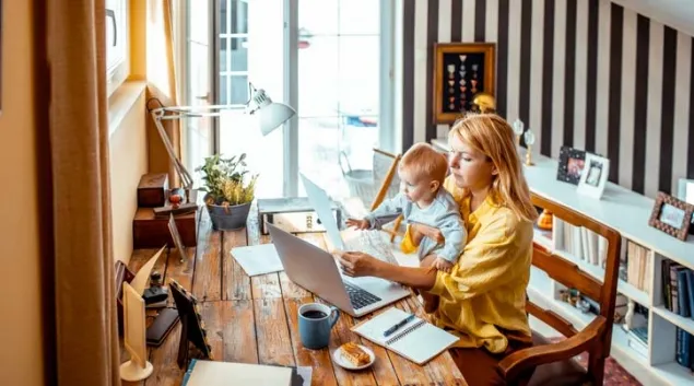 Parent at computet with child