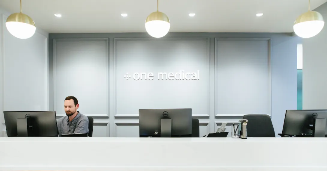 One Medical logo on wall in office room