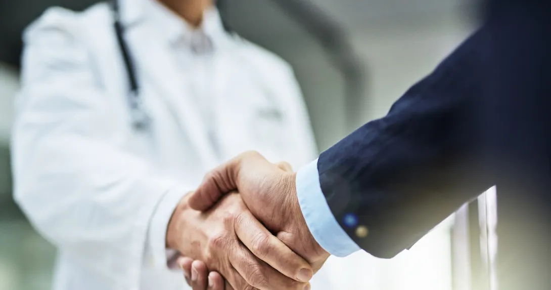 Two people shaking hands