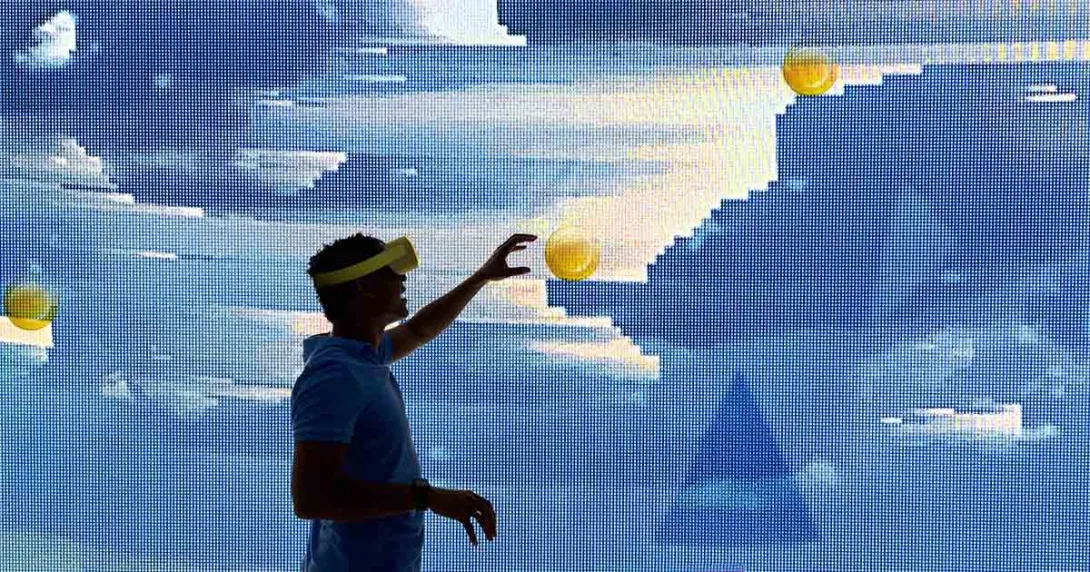 Silhouette of man interacting with a virtual environment while wearing a VR headset