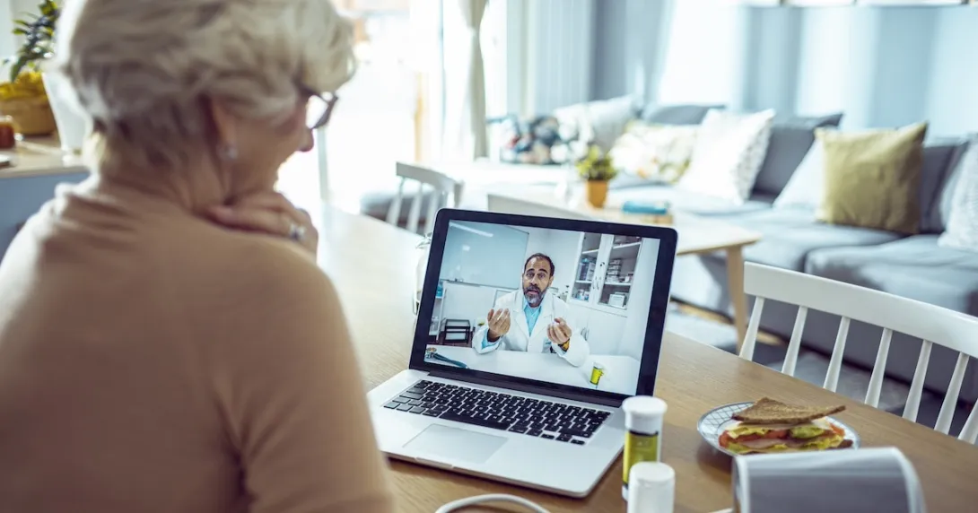 Person having an interactive conversation with a healthcare professional
