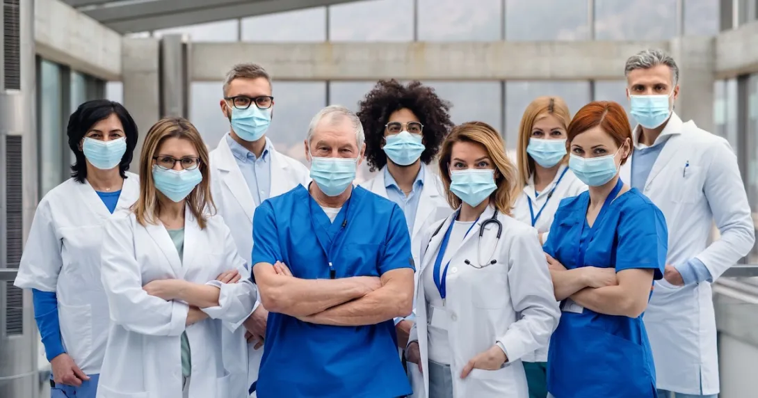Healthcare providers standing together in a hospital setting